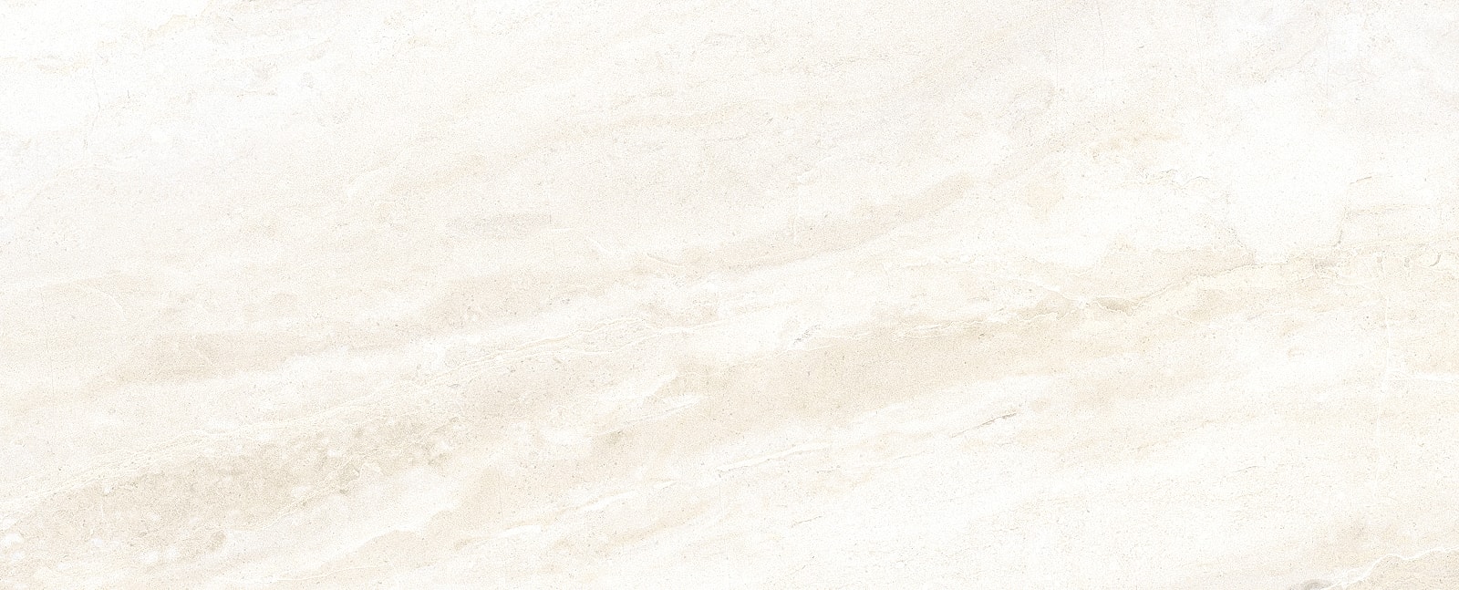 Model in black swimsuit seated confidently.